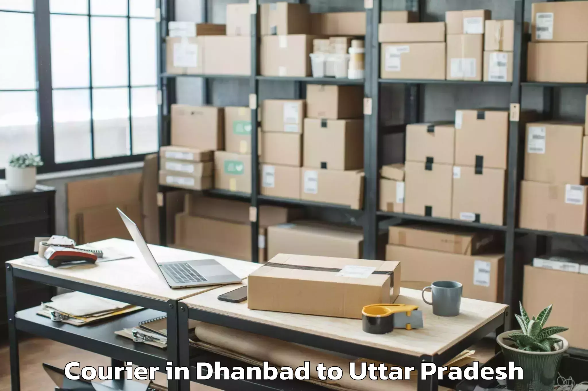 Get Dhanbad to Garautha Courier